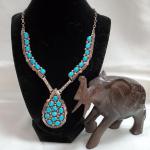 Merceti Turquoise Navajo Necklace by Kenneth Jones and Carved Wooden Elephant